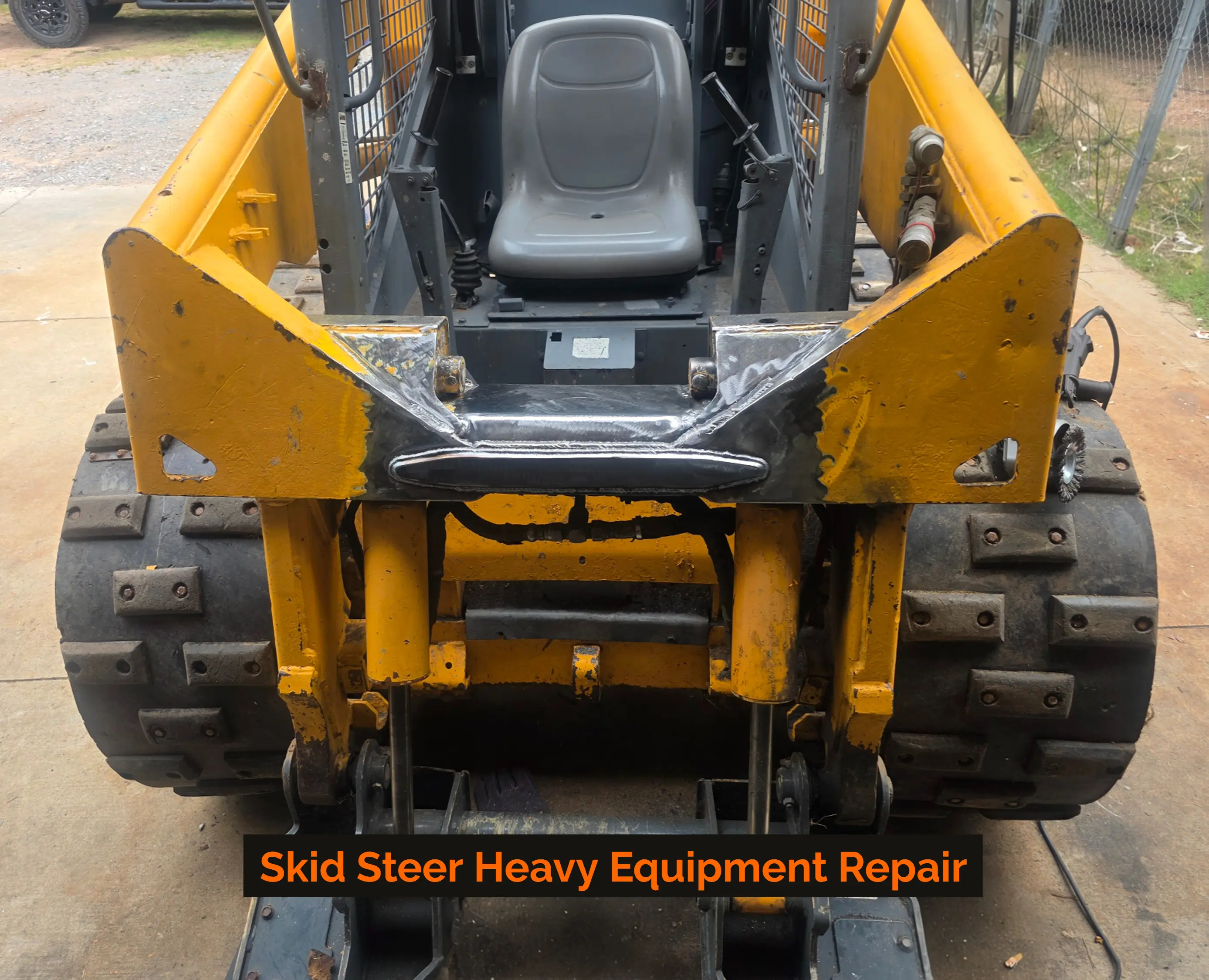 Skid steer heavy equipment repair welded on-site by Russell MetalWRX near Oklahoma City